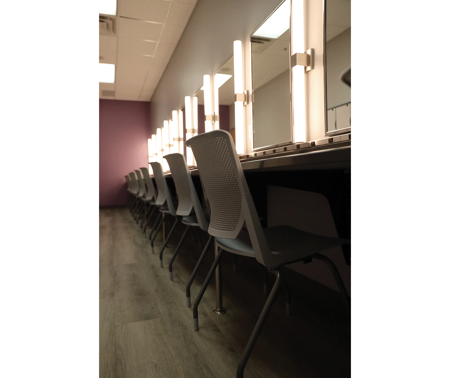 Gallery 1 - Chairs and lighting in theatre's large dressing room