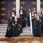 Gallery 1 - Kalamazoo Ringers, holding bells, standing on stairs