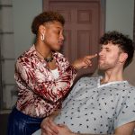 Gallery 3 - Playful moment with one actor touching another actor's nose 
